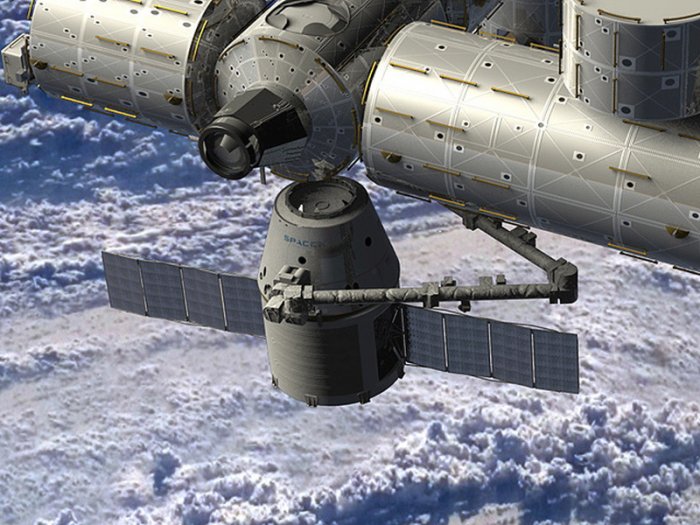 Dopravní loď Dragon u vesmírné stanice ISS (render: NASA, public domain)